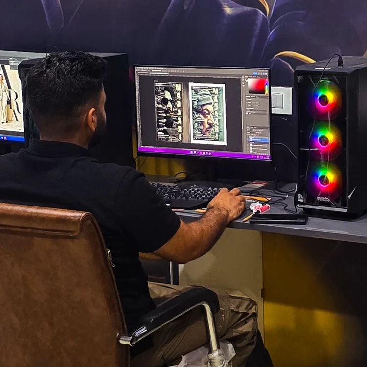 A student designing creative poster with vfx and video editing